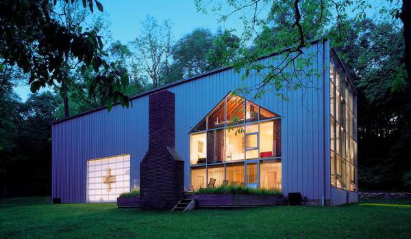 Bunny Lane recycled shipping containers House by Adam Kalkin Back by Night